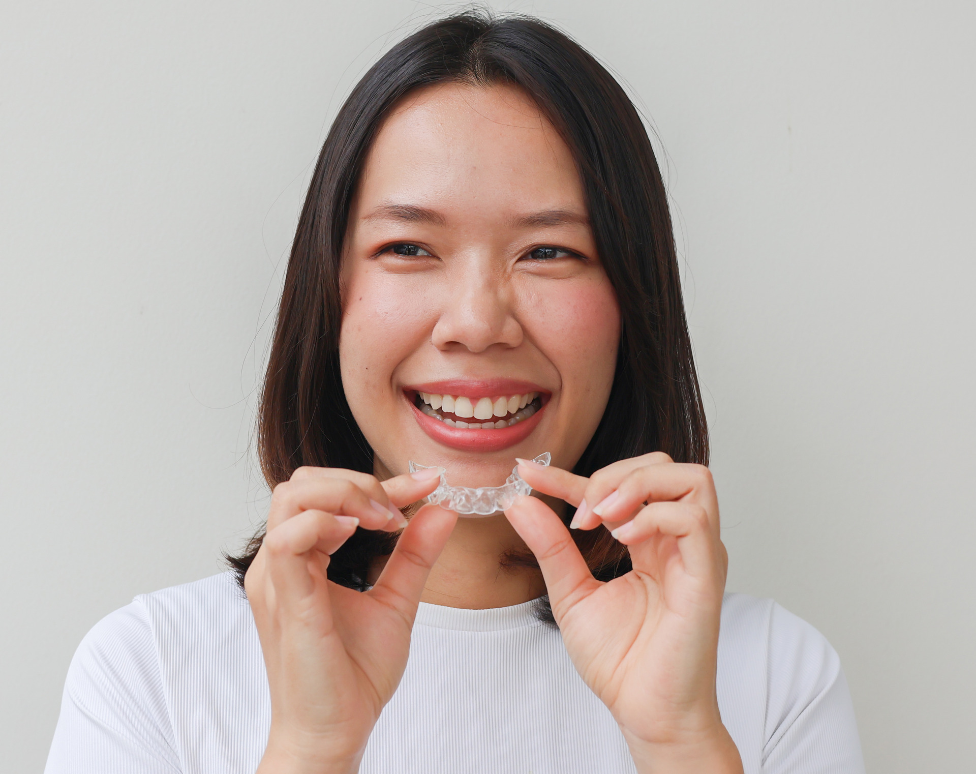 Close-up of clear Essix retainers.